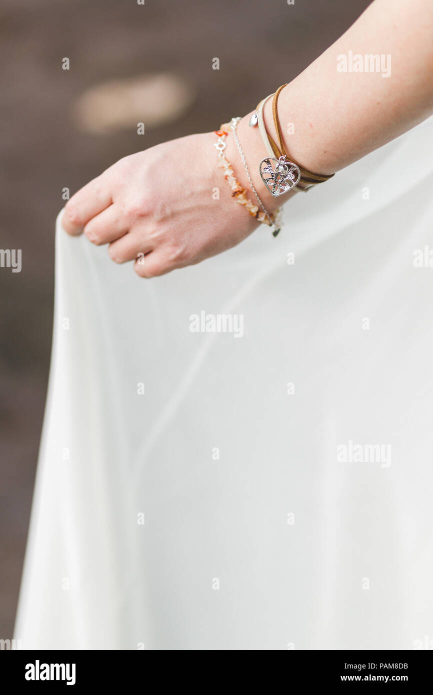 Wearing bracelet hi-res stock photography and images - Alamy
