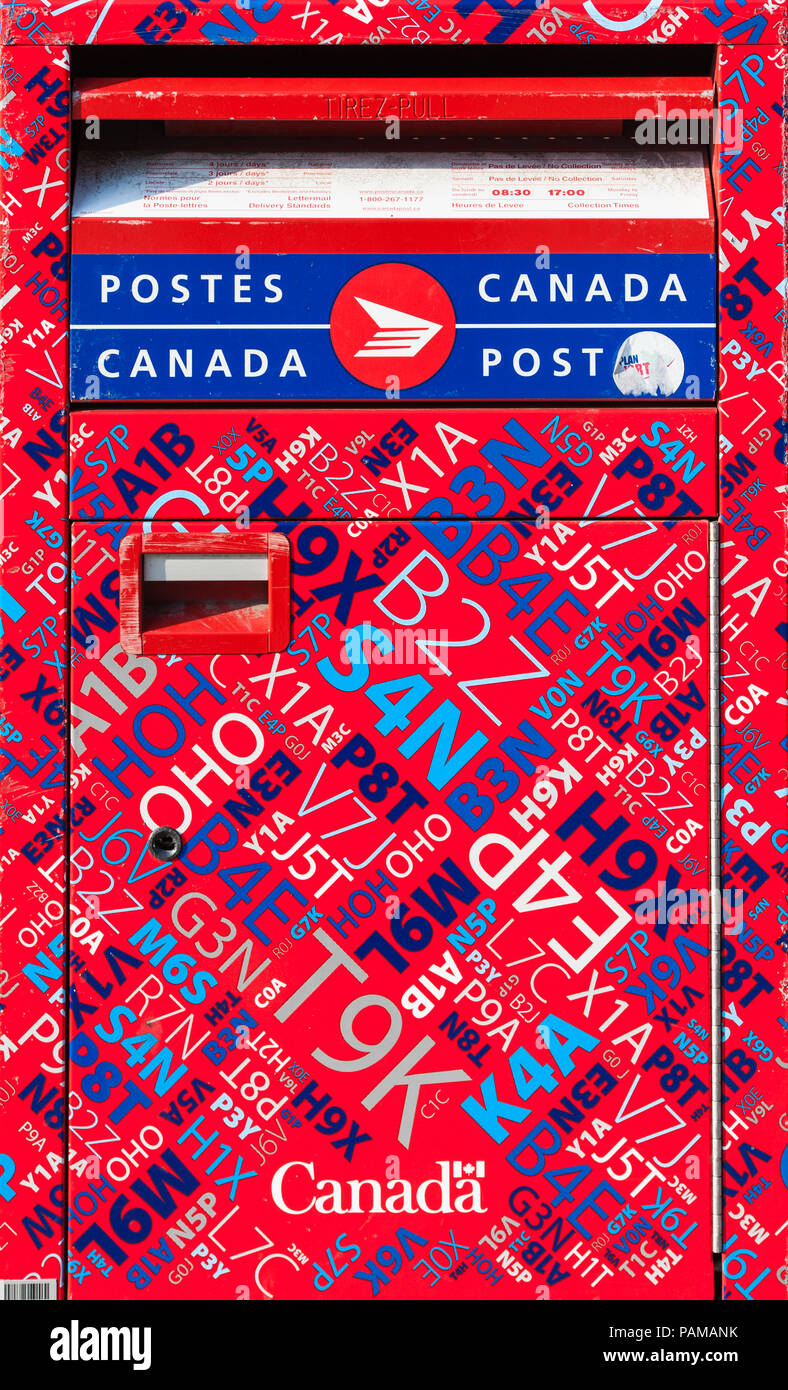 A post box on a street in downtown Montreal, Quebec. Stock Photo