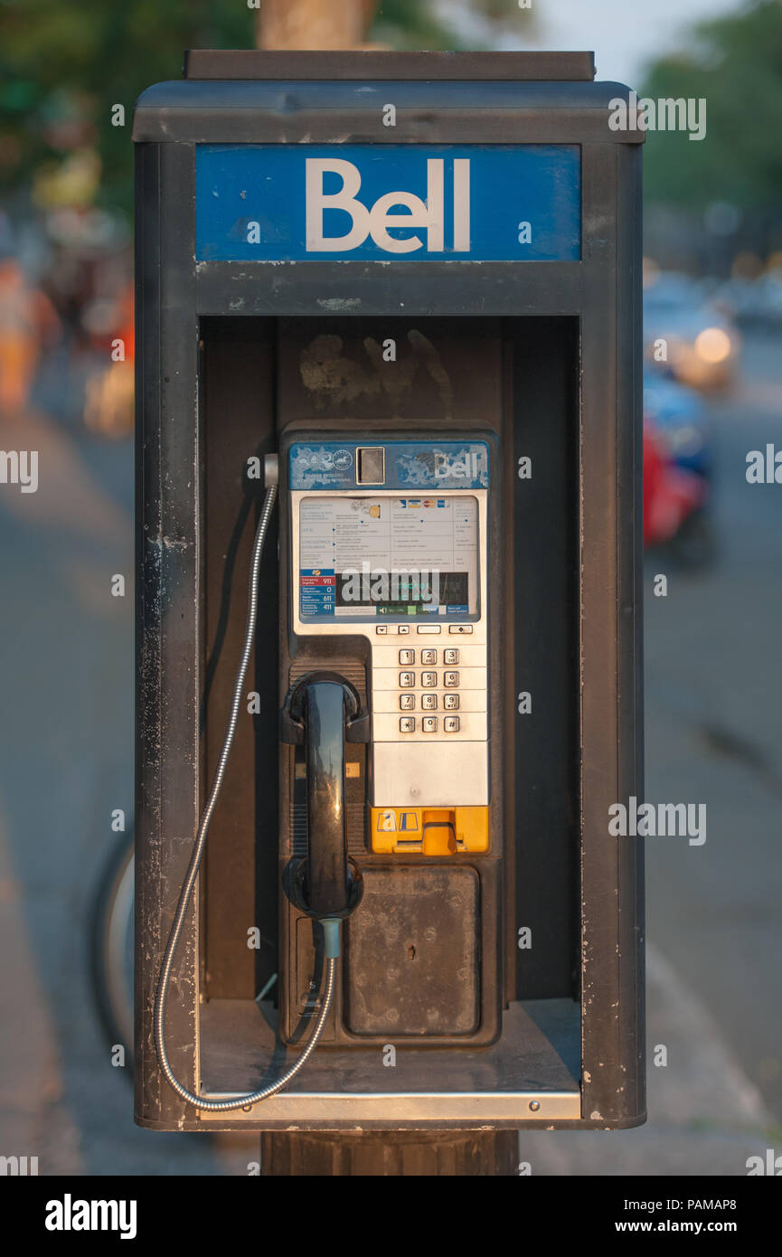 A payphone in downtown Montreal, Quebec. Stock Photo