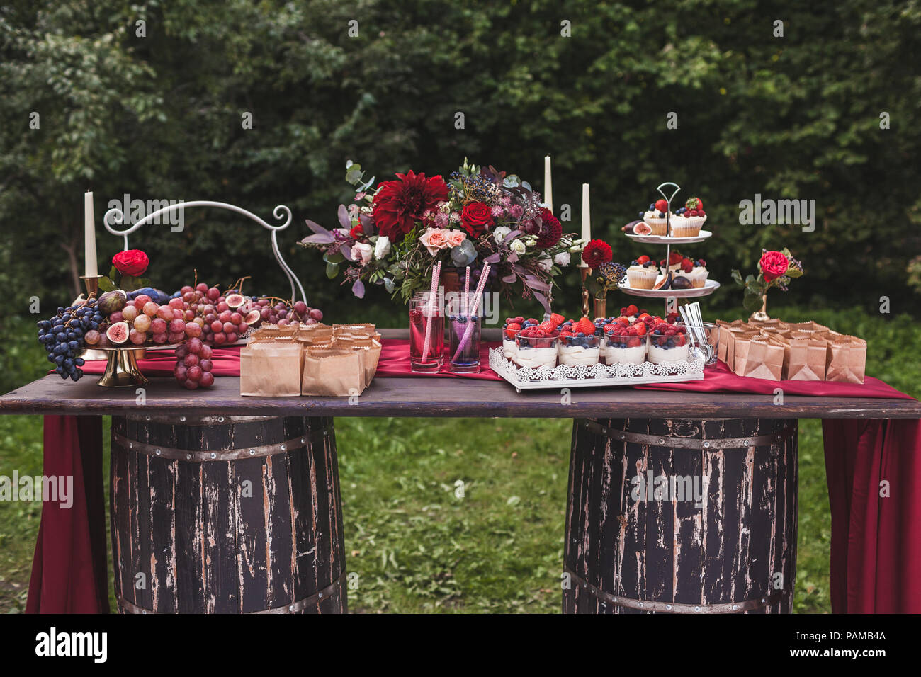 Wedding Reception Wooden Table Standing On Two Barrels Decorated