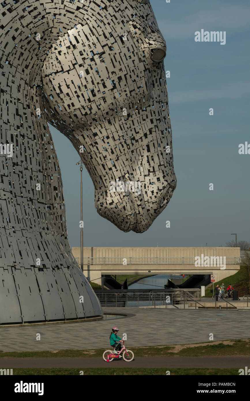 The iconic Kelpies sculpture by Andy Scott forms a gateway to the Forth and Clyde canal basin at Helix Park near Falkirk, Scotland, UK Stock Photo