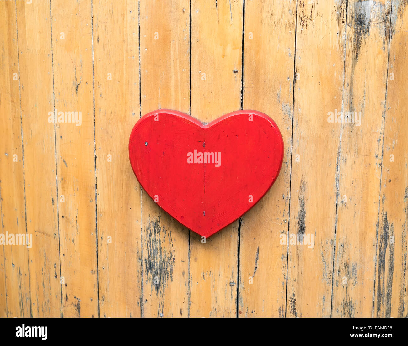 alentine day. Red heart on the wooden boards. Stock Photo