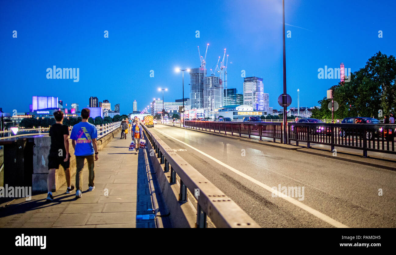 People Walking On Waterloo Bridge At Night London UK Stock Photo