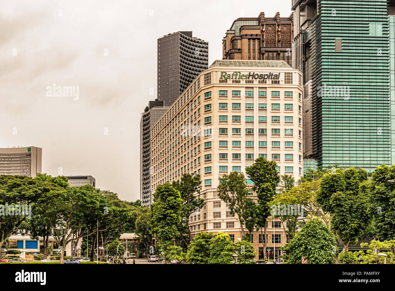 Singapore - January 10, 2018: Facade of the Raffles Hospital complex buildings as seen from Orchid Road in the city of Singapore. Stock Photo