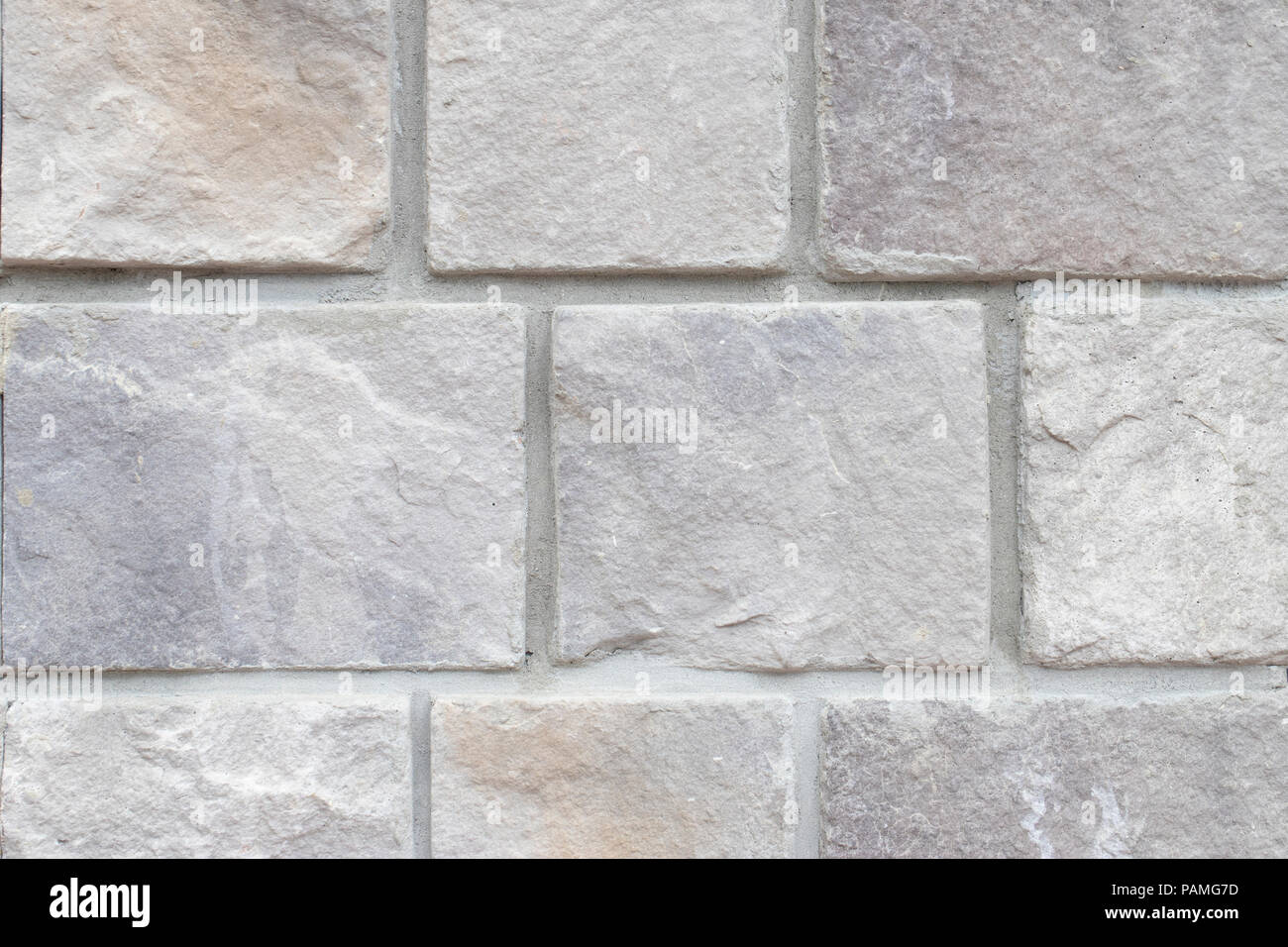 Gray stone wall closeup background photo texture Stock Photo - Alamy