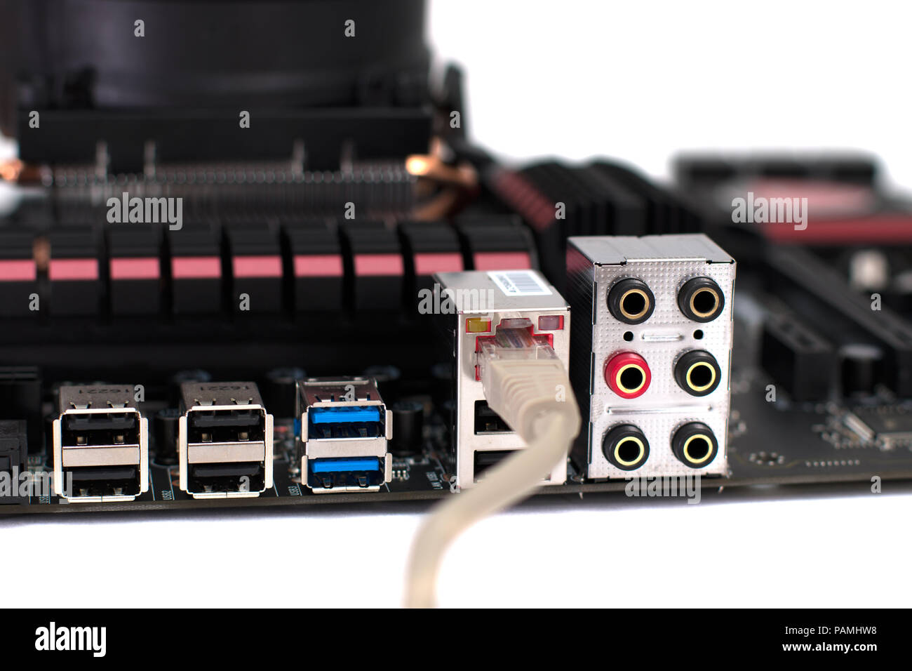 A motherboard with a network cable connected to it Stock Photo
