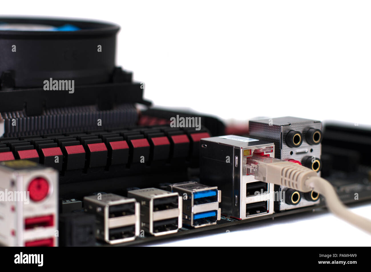 A motherboard with a network cable connected to it Stock Photo