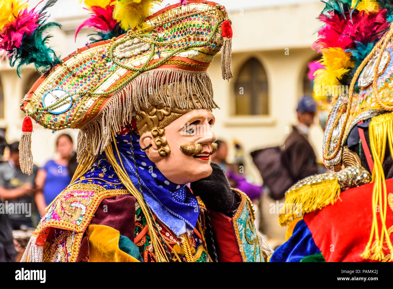 Parramos, Guatemala - December 28, 2016: Traditional folk dancers in mask & costume for Dance of the Moors & Christians near colonial Antigua Stock Photo