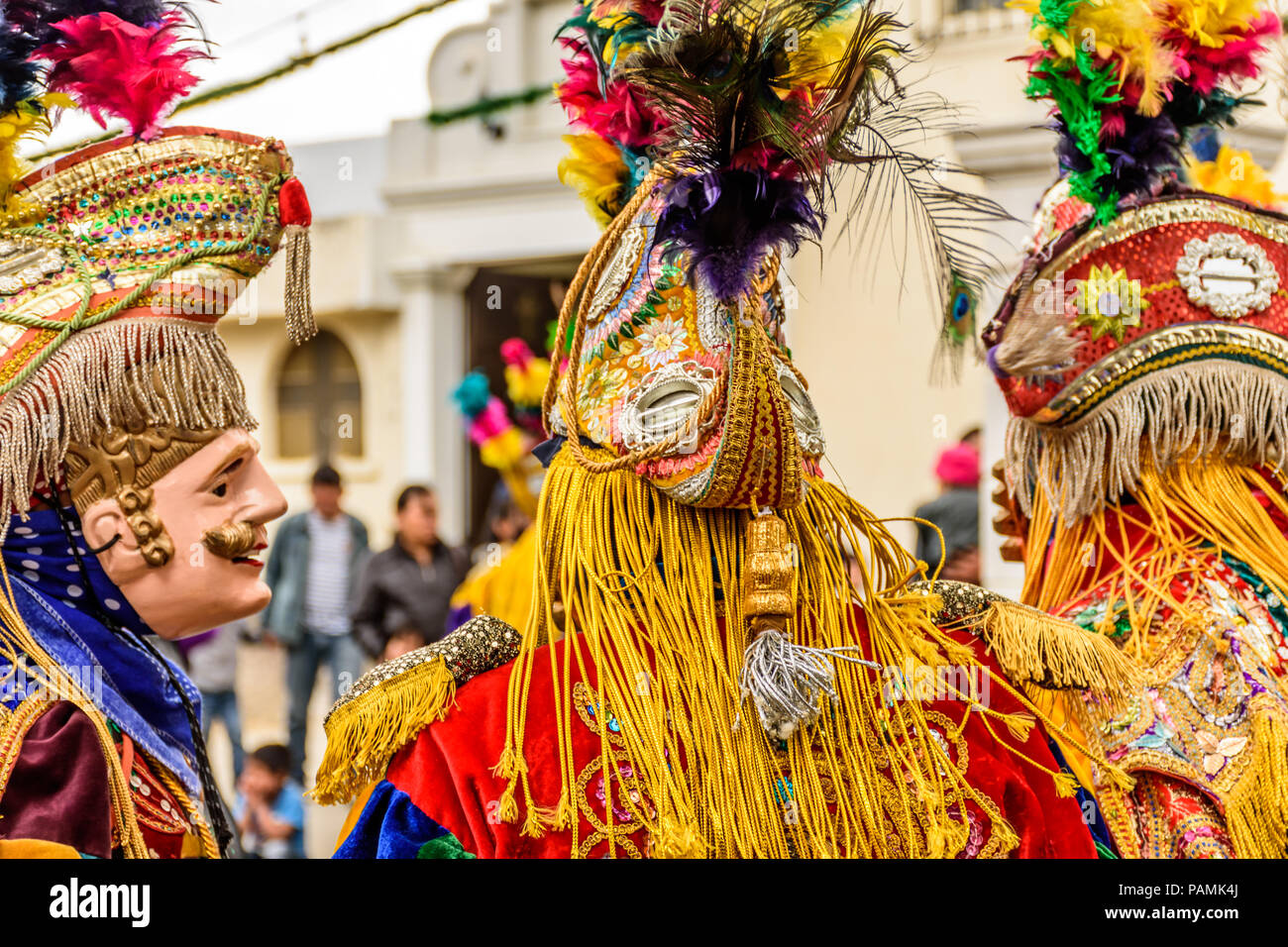 Parramos, Guatemala - December 28, 2016: Traditional folk dancers in mask & costume for Dance of the Moors & Christians near colonial Antigua Stock Photo