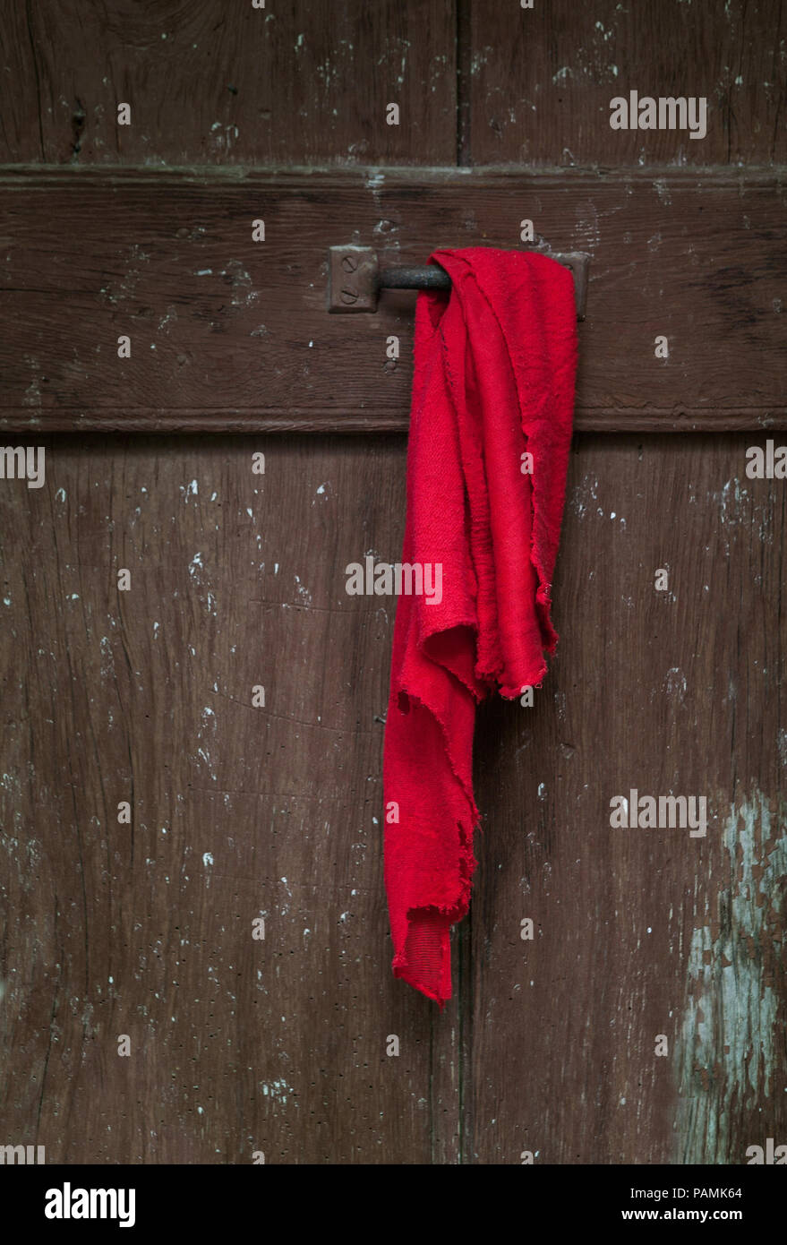 piano Dat handtekening red rag hanging on a door Stock Photo - Alamy