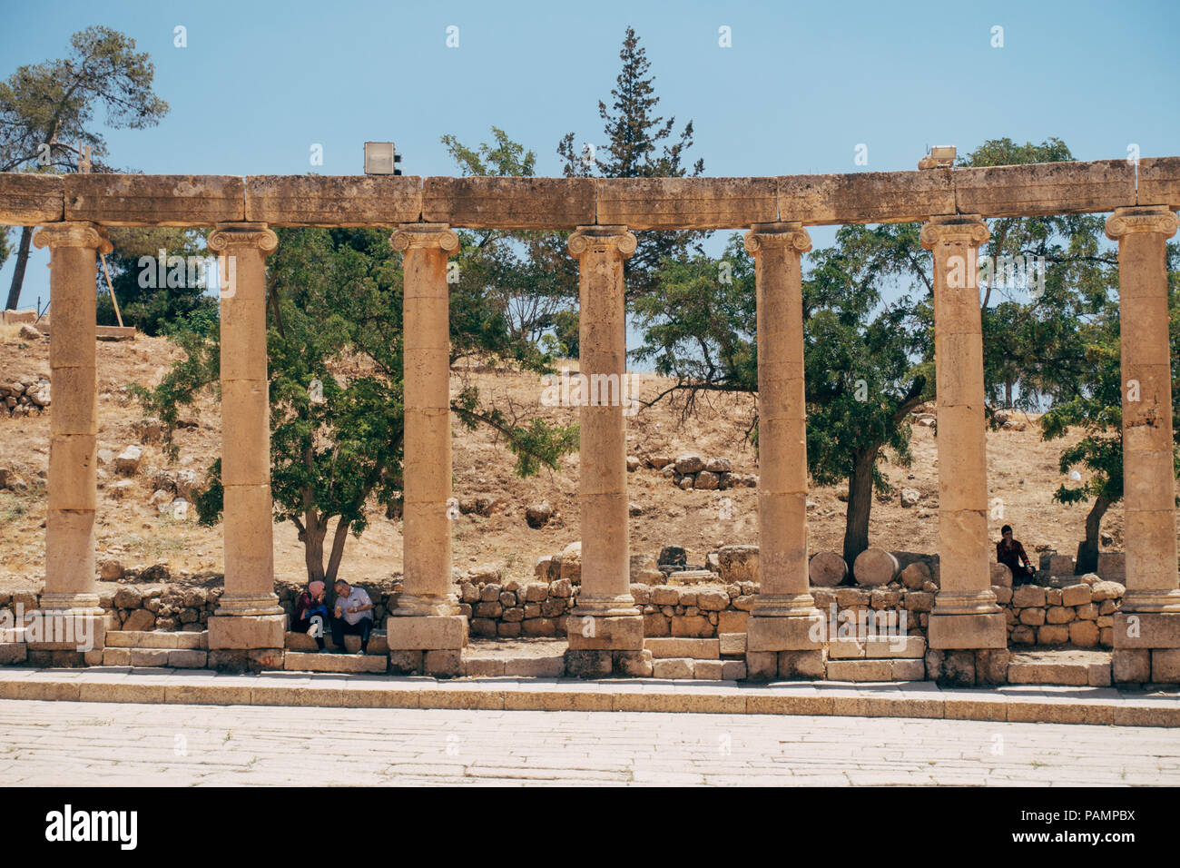 The ruined stones, concrete slabs and pillars in the ancient Mediterranean city of Jerash, Jordan Stock Photo