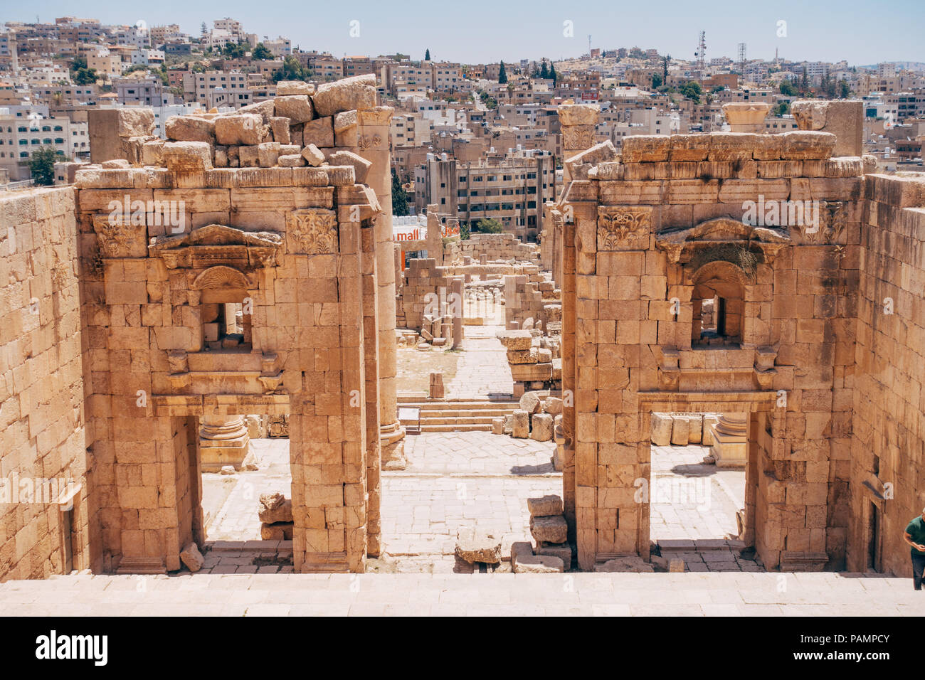 The ruined stones, concrete slabs and pillars in the ancient Mediterranean city of Jerash, Jordan Stock Photo