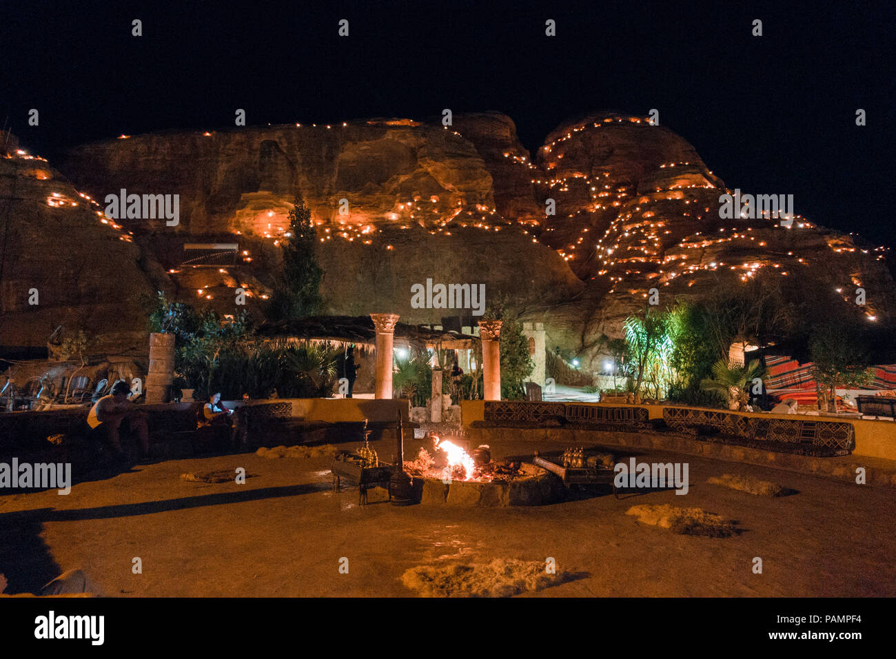 the view at night over the common area of a tourist Bedouin camp in Wadi Musa, near Petra, Jordan Stock Photo