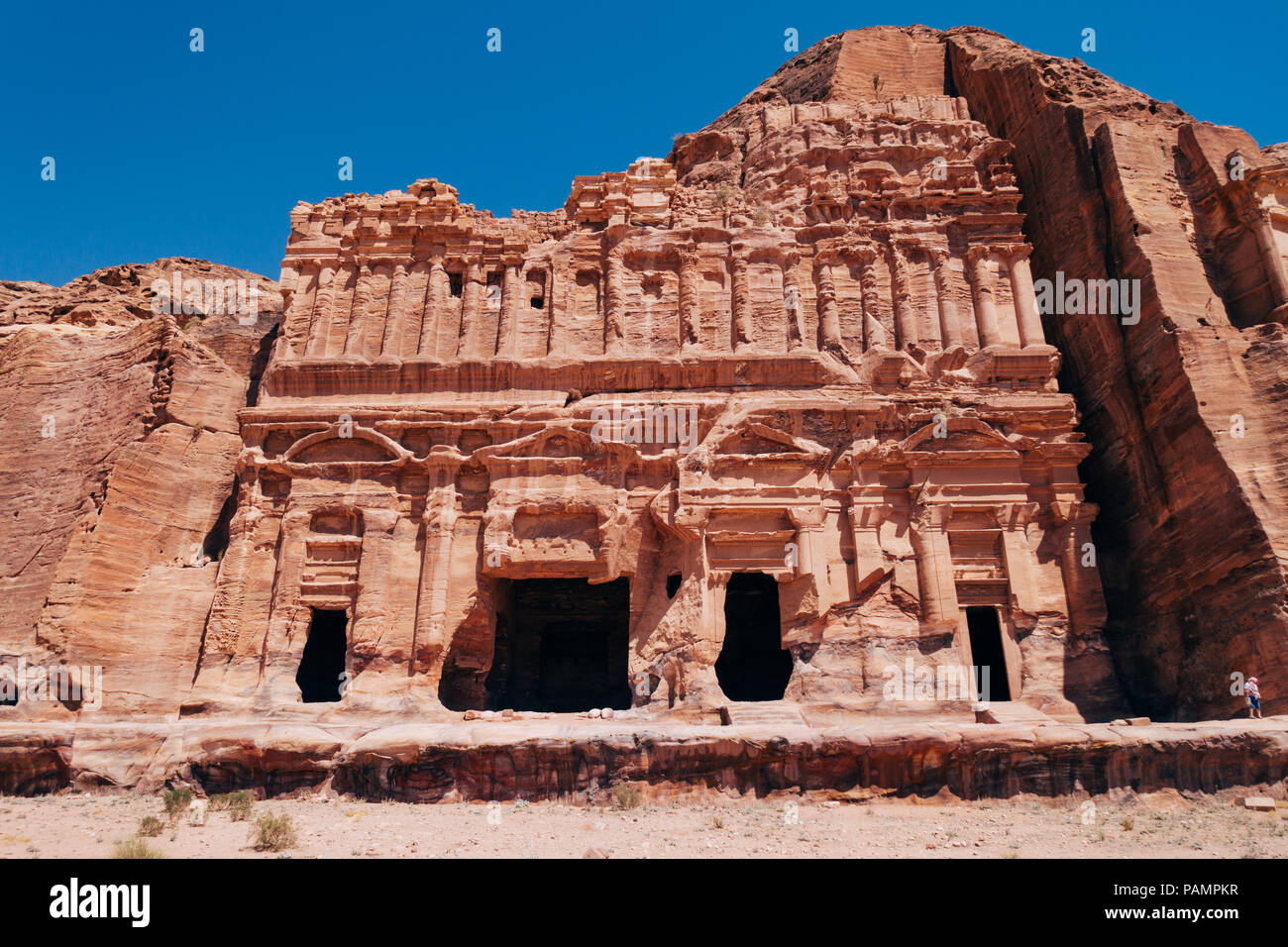 A tomb entrance carved into the rock in the Lost City of Petra, Jordan Stock Photo