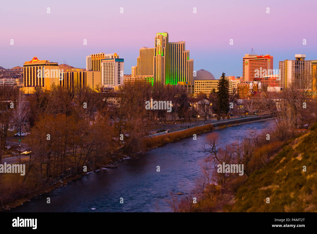 Scenic landscape of Reno city at sunset with river on foreground Stock Photo