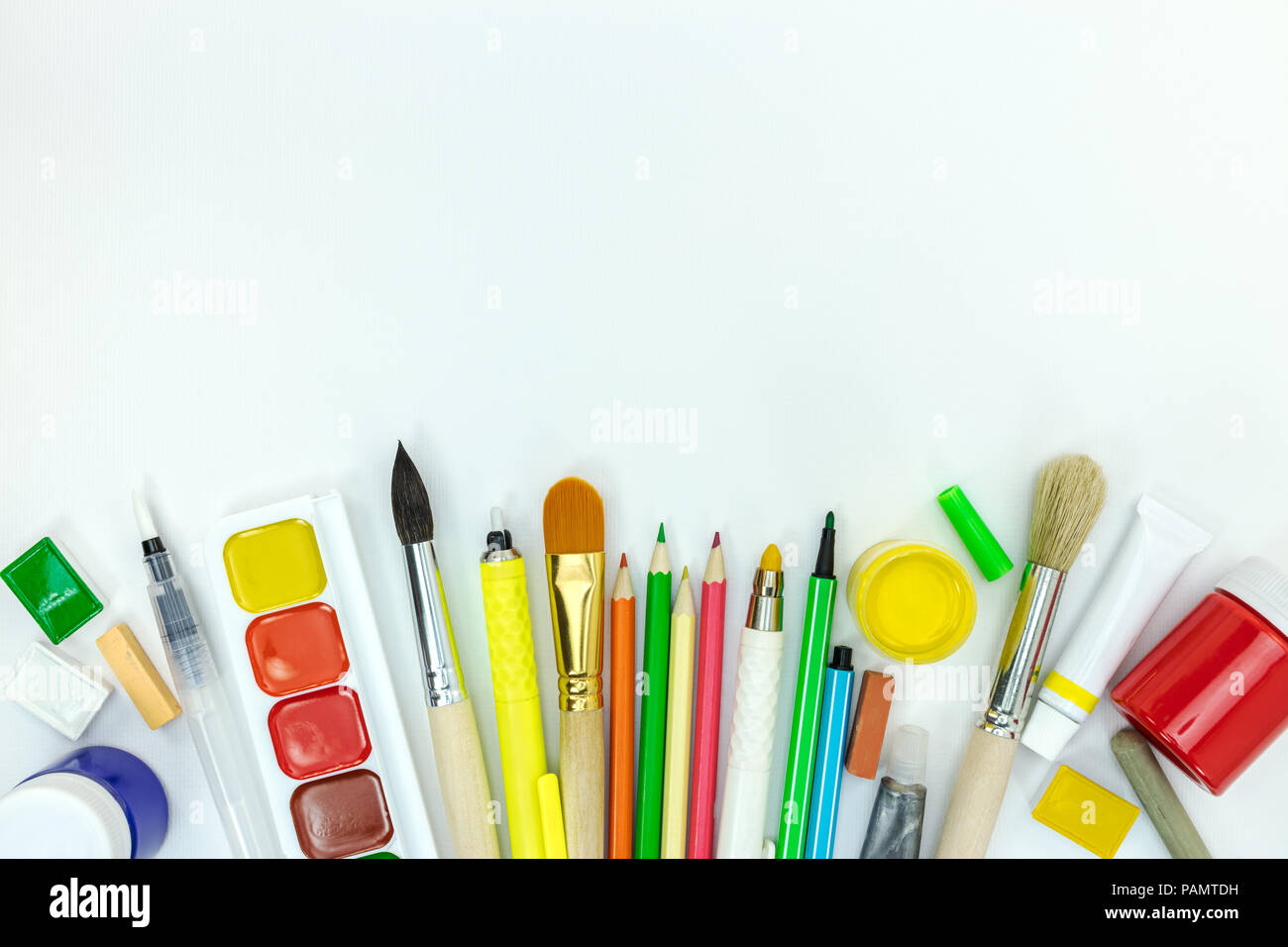 https://c8.alamy.com/comp/PAMTDH/school-painter-tools-on-white-background-watercolor-paints-pencils-crayons-flat-view-PAMTDH.jpg