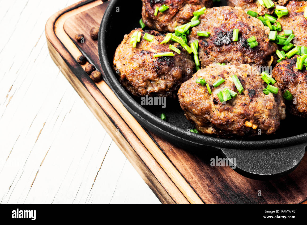 Roasted beef meatballs in castiron skillet.Delicious cutlet Stock