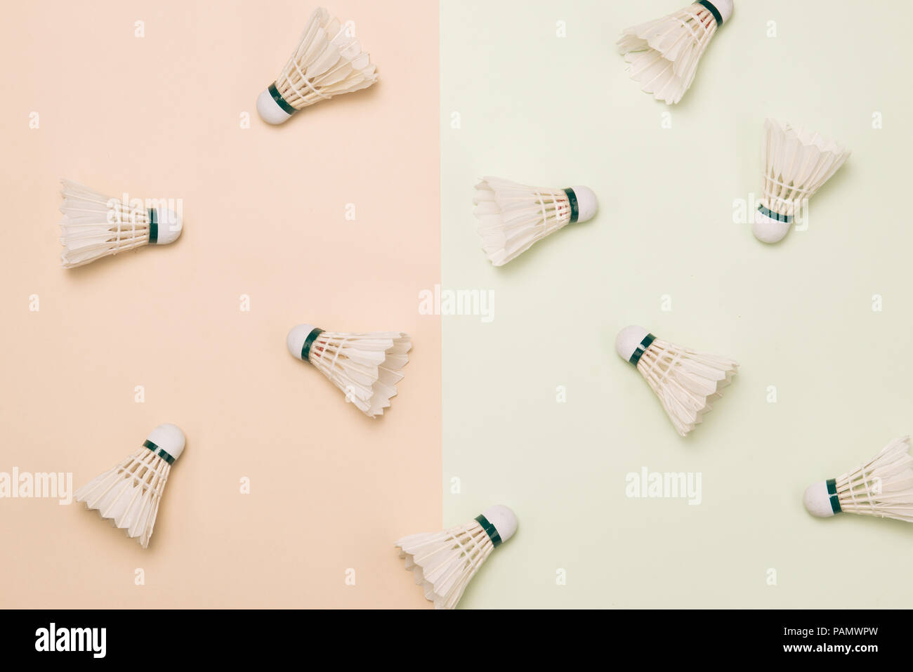 top view of composition with badminton shuttlecocks on pastel color background Stock Photo