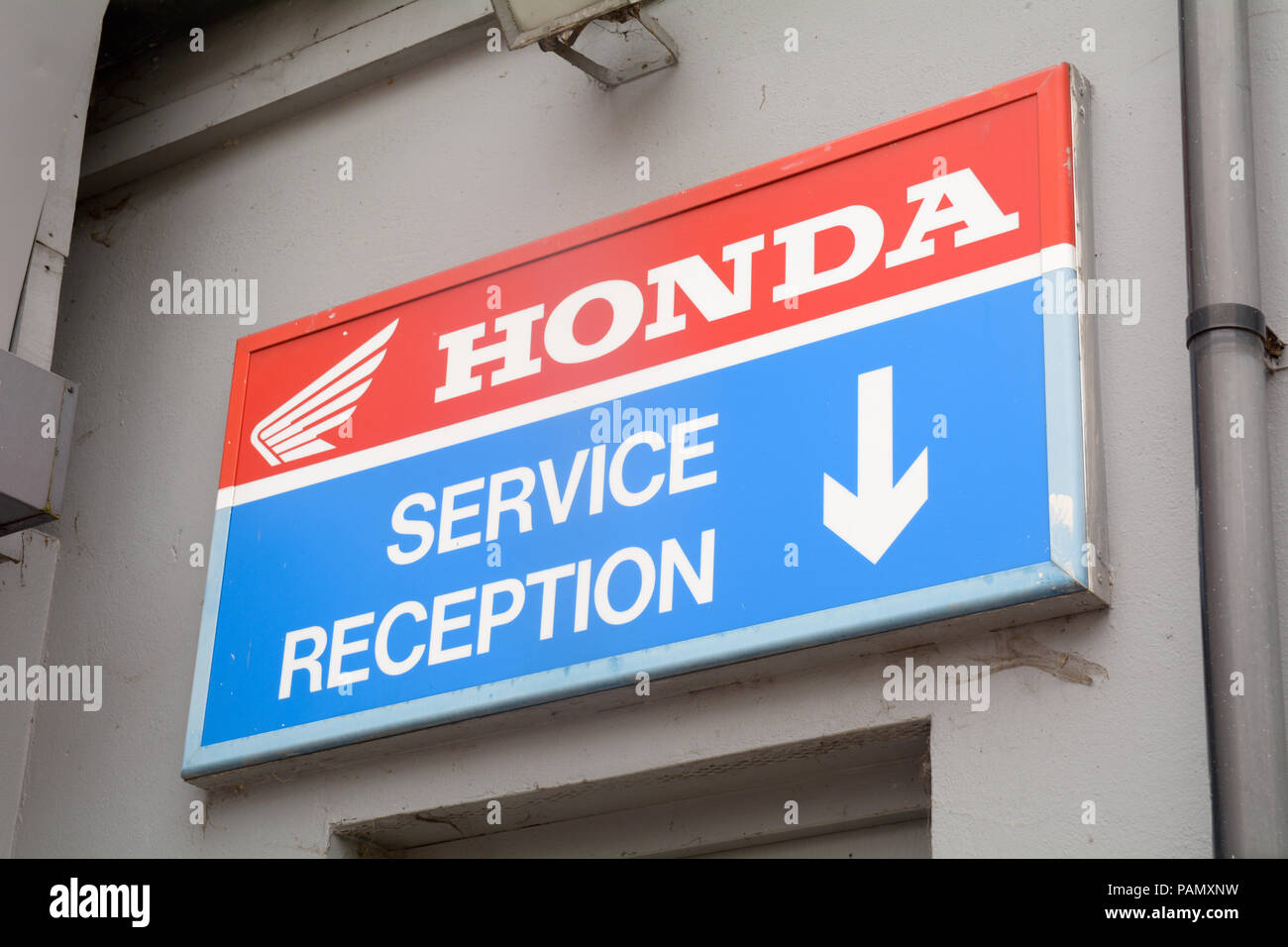 Honda Sign For Service Reception At Motorcycle Garage Stock Photo