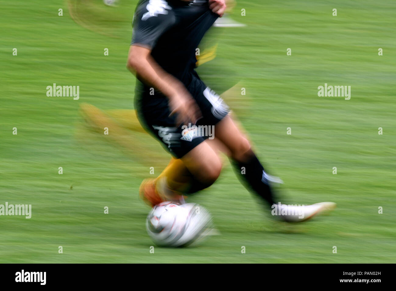 Soccer feature, legs and ball Stock Photo Alamy