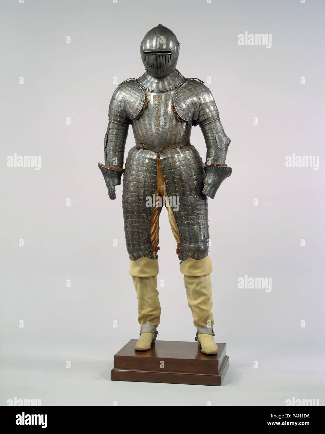 Armor for a Member of the Barberini Family. Culture: Italian, Milan. Dimensions: Wt. 34 lb. 8 oz. (15.65 kg); Wt. of helmet 5 lb. 3 oz. (2350 g). Date: ca. 1623-30.  This armor is a deluxe version of a typical cuirassier's armor, worn by heavy cavalry armed with sword and pistols. Its rich ornament and light weight, however, indicate that it was designed primarily for ceremonial wear and as a symbol of martial status.  The punched and chiseled decoration is characteristic of elaborate Milanese armor of the early seventeenth century. The designs include numerous crowned ovals enclosing bees, th Stock Photo