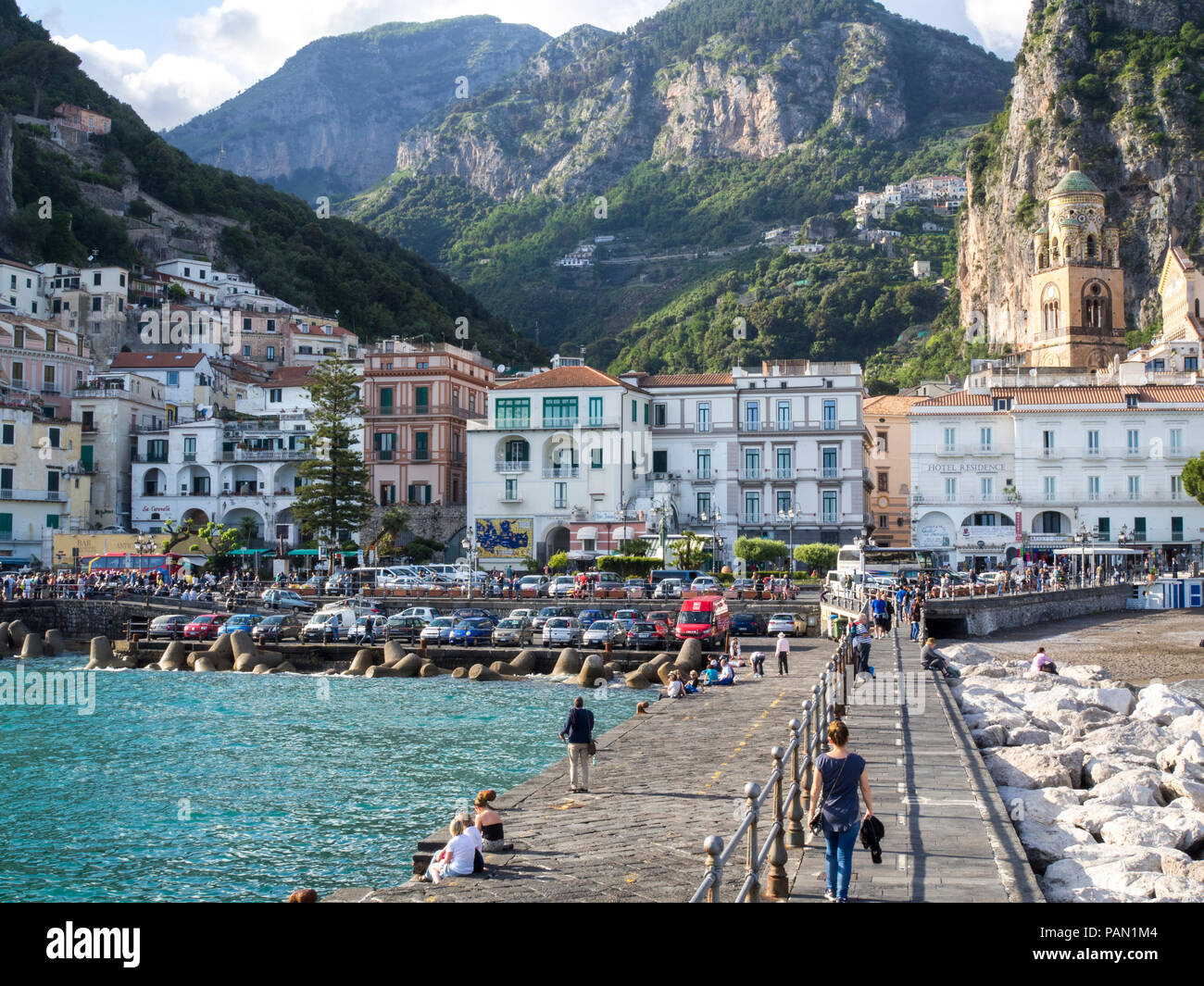 The idyllic village of Amalfi, Italy, as seen from the break water. Stock Photo