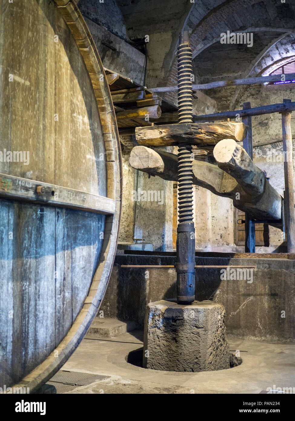 An old wooden wine press at Grazi Wines, one of the new generation of natural wineries working with indigenous grape varieties, Sicily, Italy. Stock Photo