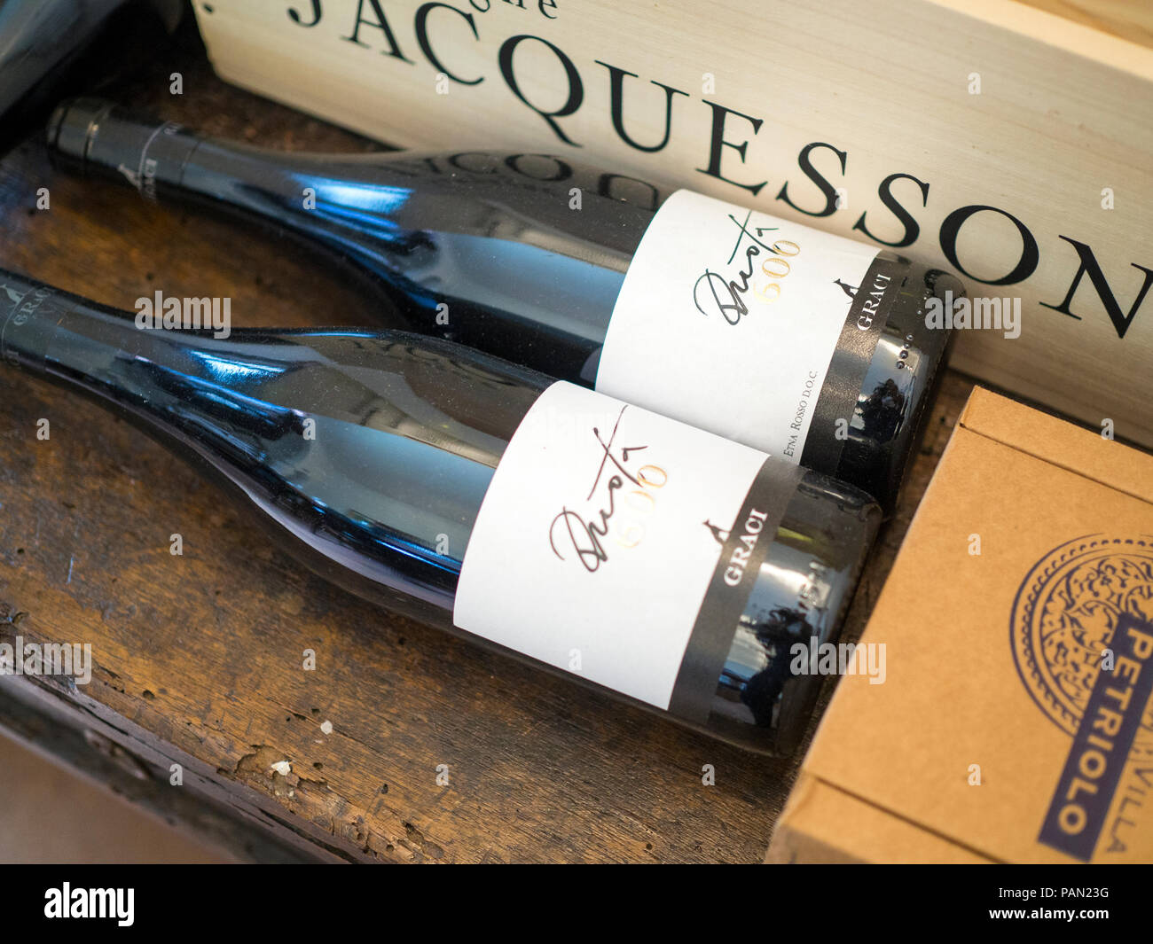 Bottles of wine at Grazi Wines, one of the new generation of natural wineries working with indigenous grape varieties, Sicily. Stock Photo