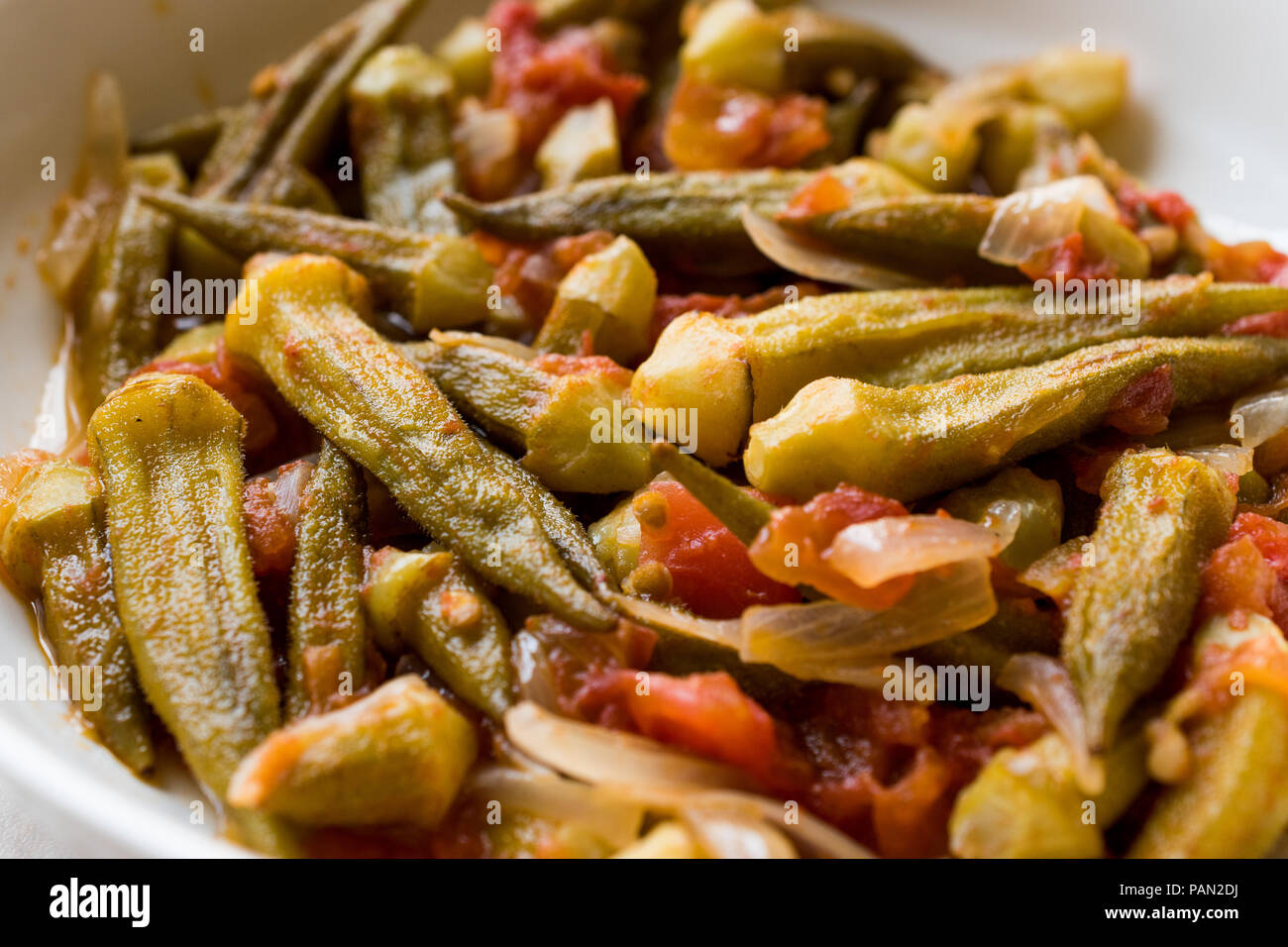 Turkish Food Okra Dish with Tomatoes and Onion Slices / Bamya