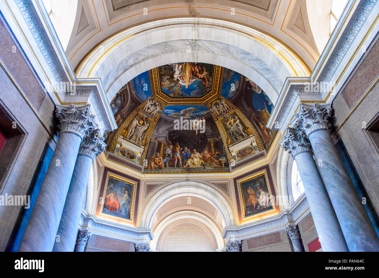 VATICAN, VATICAN CITY - MAY 7, 2016: Frescoes at the ceiling at the Vatican Museum. It was established in 1506 Stock Photo