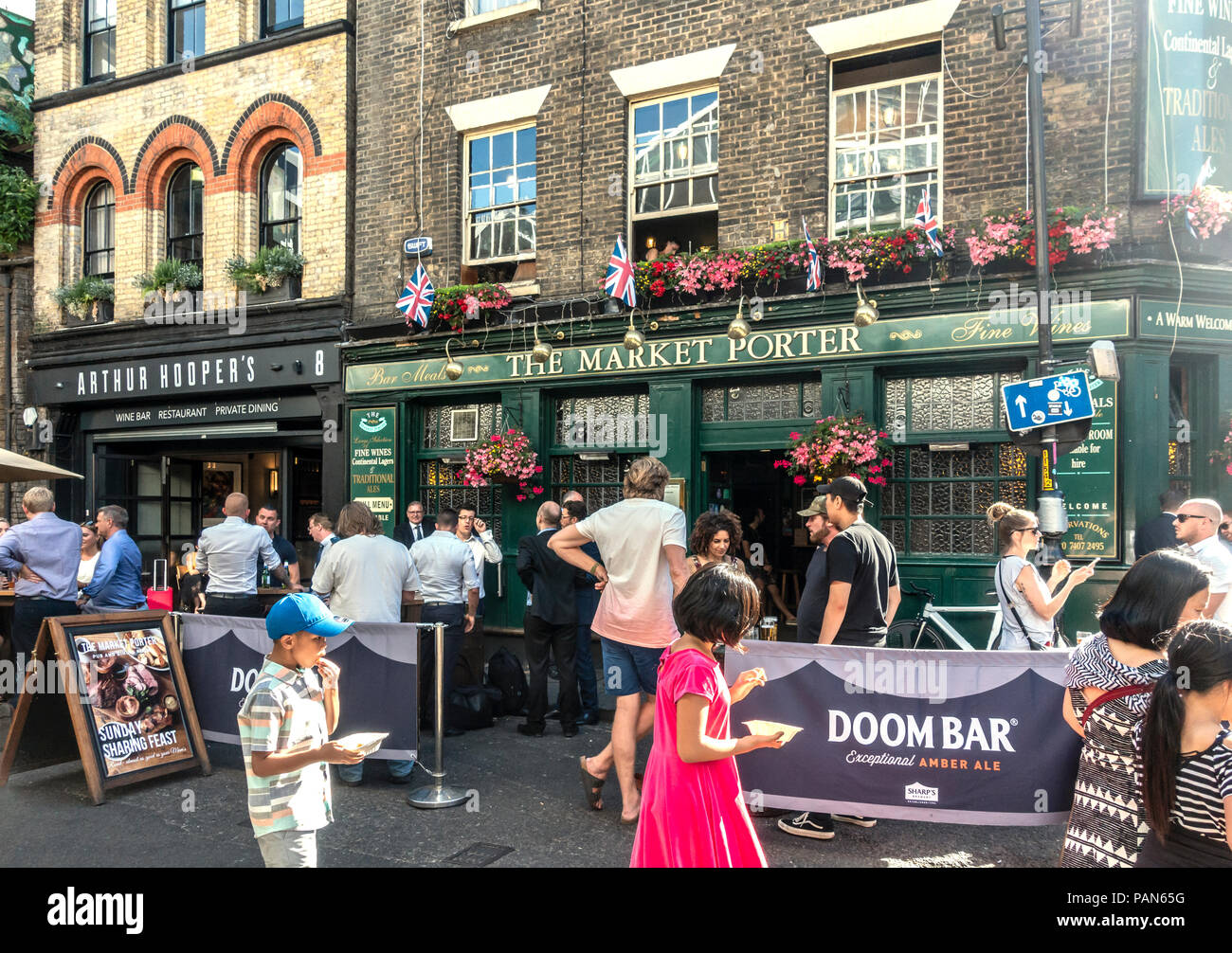 Customers in the outdoor areas of The Market Porter public Hous and