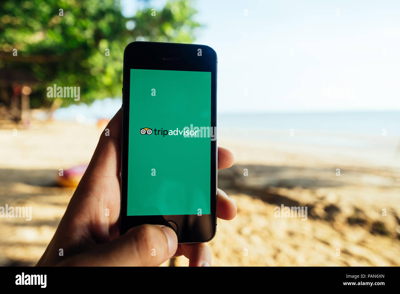 Koh Lanta, THAILAND - JULY 28, 2018: Closeup of iPhone Screen with TRIPADVISOR LOGO during Start screen Stock Photo