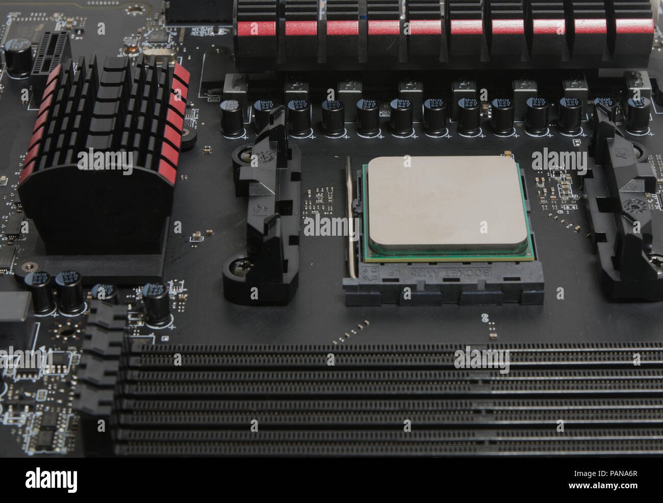 Installing the processor on the motherboard Stock Photo - Alamy