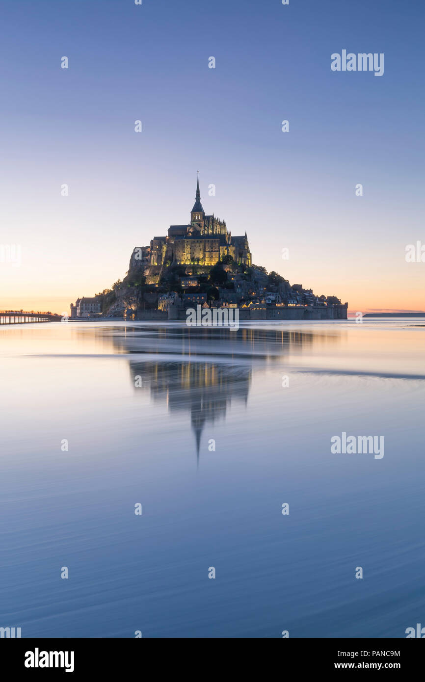 France, Normandy, view to lighted Mont Saint-Michel, blue hour Stock Photo