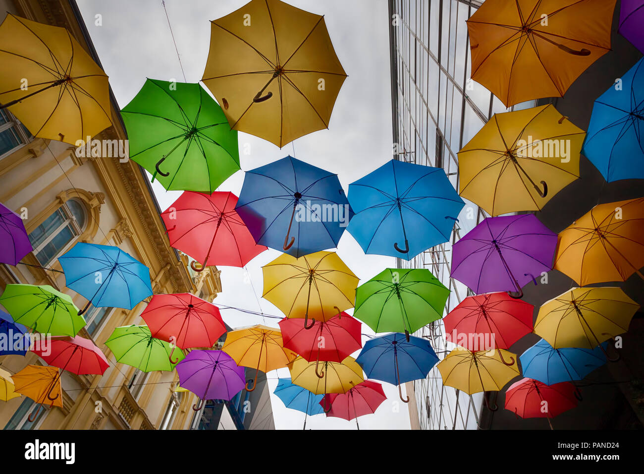Colorful umbrellas in the sky - Belgrade city centre, Serbia Stock Photo