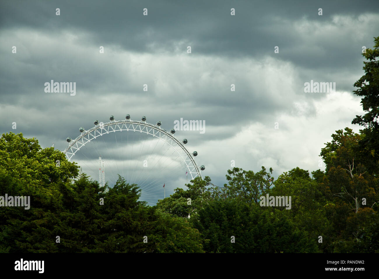 The London Eye with a moody sky Stock Photo
