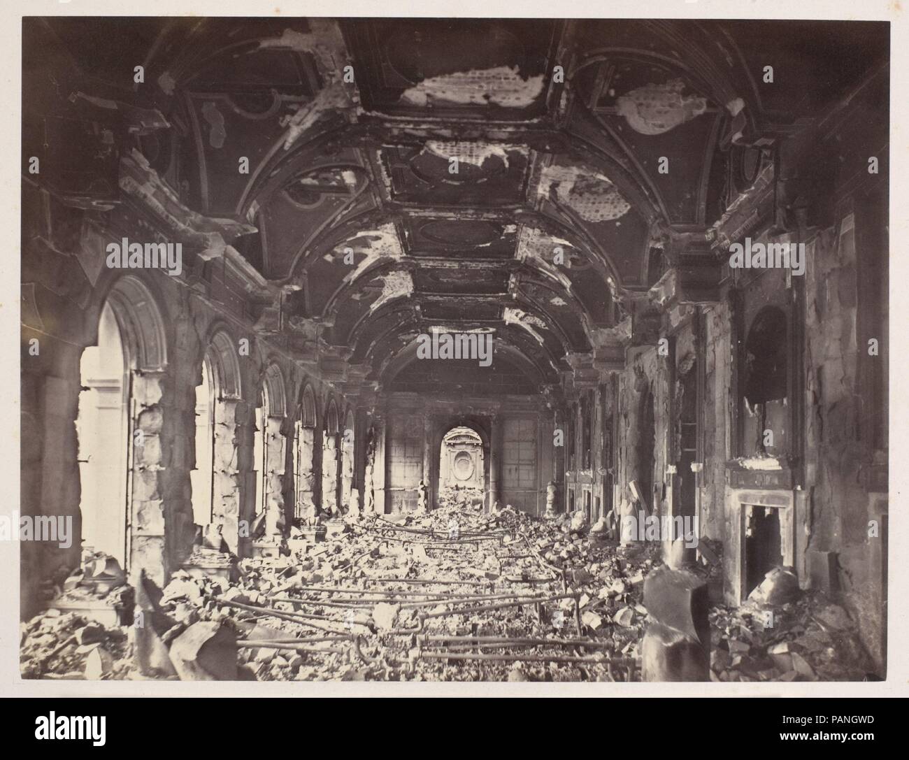 Grande Salle du Conseil d'Etat. Artist: Charles Soulier (French, 1840-1875). Dimensions: Image: 19 x 24.9 cm (7 1/2 x 9 13/16 in.)  Mount: 34.7 x 47.2 cm (13 11/16 x 18 9/16 in.). Date: May 1871.  Soulier's photograph shows the charred remains of the once lavish audience hall of the Council of State in the Palais d'Orsay, a building begun by Napoleon I, completed in 1840 under King Louis-Philippe, and burned by the Communards on May 23, 1871. In the last years of the nineteenth century, these ruins were replaced by a new railway station, the Gare d'Orsay, which, in turn, was transformed in the Stock Photo