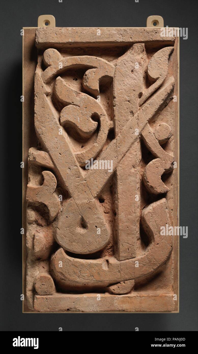 Fragment of a Frieze. Dimensions: H. 22 1/16 in. (56 cm)  W. 11 7/16 in. (29 cm)  D. 3 9/16 in. (9 cm). Date: 11th century.  This panel is believed to have formed a large frieze along the entrance to a prayer hall that served a densely populated residential neighborhood. The frieze was originally painted in red and blue and included the word al-sultan, a title that first occurred in monumental epigraphy in the eleventh century with Seljuq and Ghaznavid rulers. It has been suggested that the frieze's inscription originally bore the titles of the Seljuq sultan Malik Shah (r. 1073-92). Museum: Me Stock Photo