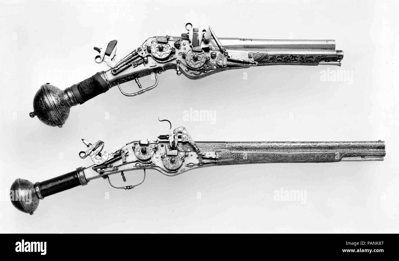 Double-Barreled, Double-Wheellock Pistol. Culture: German, Augsburg. Dimensions: L. 25 3/8 in. (64.4 cm); L. of barrel 17 1/8 in. (43.5 cm); Cal. .358 in. (9.1 mm); Wt. 4 lb. 4 oz. (1928 g). Date: ca. 1580.  Although most sixteenth-century firearms were single-shot, gunmakers sometimes experimented with various multishot weapons. This example gave two shots, each barrel having its own wheellock. The metal stock, providing extra support for the double mechanism, is etched with hunting scenes. Museum: Metropolitan Museum of Art, New York, USA. Stock Photo