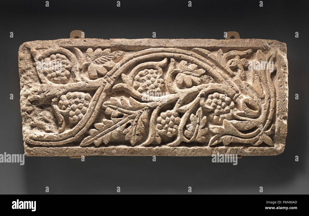 Panel with Grapevine Emerging from a Bed of Leaves. Dimensions: H. 26 3/4  in. (68 cm) W. 11 13/16 in. (30 cm) D. 2 3/4 in. (7 cm) Wt. 52 lbs. (23.6