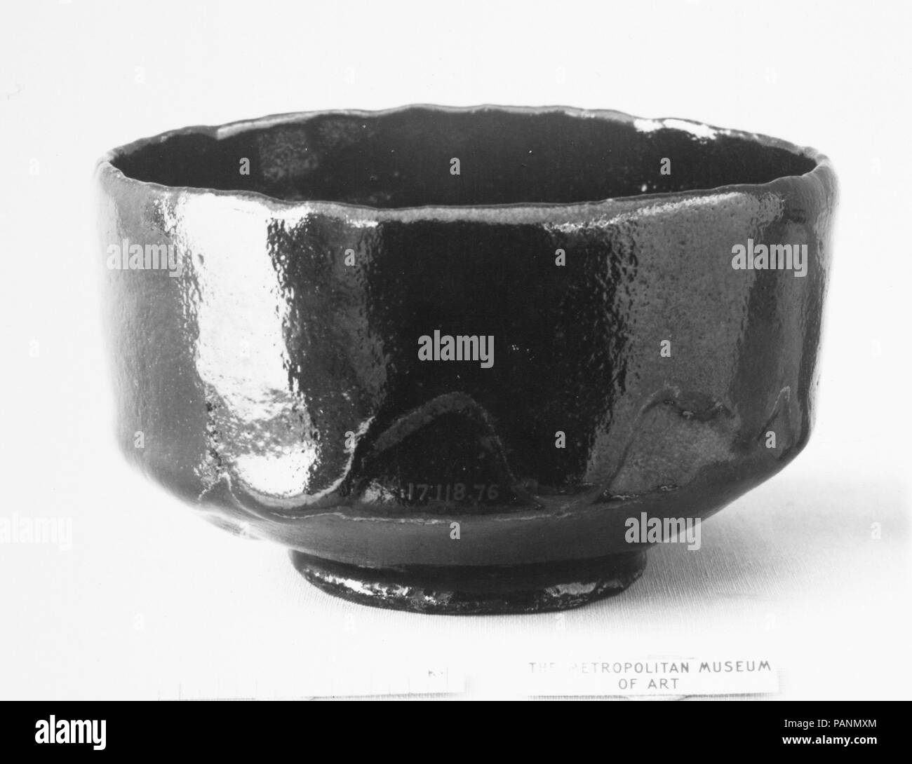 Teabowl. Artist: Raku Donyu (Japanese, died 1656). Culture: Japan. Dimensions: H. 3 in. (7.6 cm); Diam. 5 in. (12.7 cm). Date: ca. 1650. Museum: Metropolitan Museum of Art, New York, USA. Stock Photo