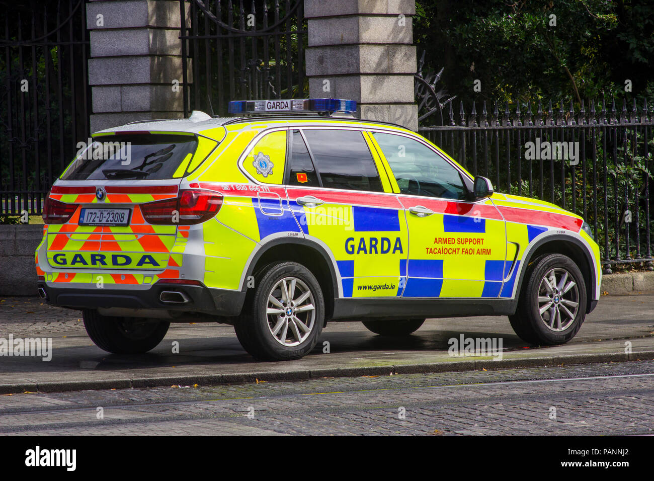 20 July 2018 An Irish police car parked on the pavement while the Garda answer an emergency in Phoenix Park Dublin Ireland Stock Photo