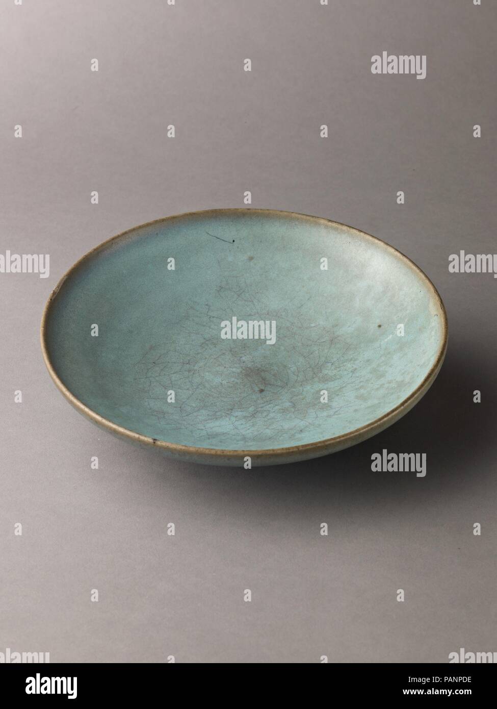 Shallow dish, Jun ware. Artist: Chinese , Northern Song Dynasty. Culture: Chinese. Dimensions: Diameter: 7 3/8 in. (18.7cm.). Date: 11th-12th century. Museum: Metropolitan Museum of Art, New York, USA. Stock Photo
