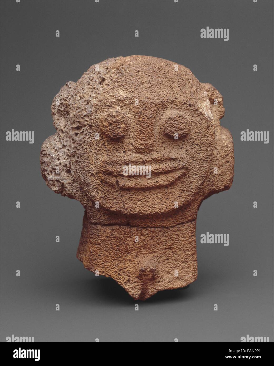 Figure. Culture: Hawai'i. Dimensions: H. 7 3/4 x W. 6 1/8 in. (19.7 x 15.5  cm). Date: 9th-11th century (?). This enigmatic head and torso is one of a  group of eleven