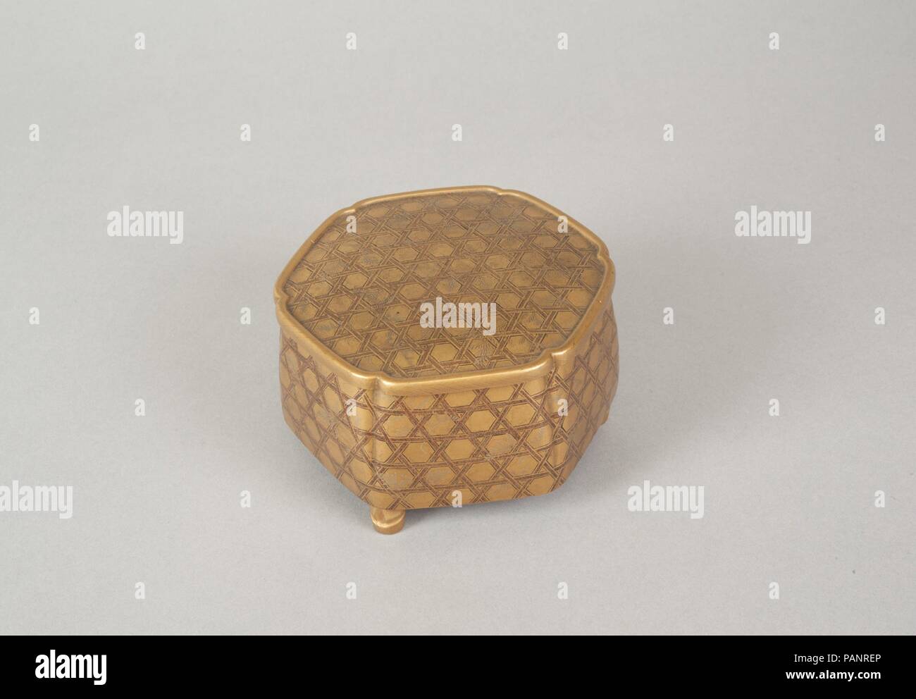 Cosmetic Box. Culture: Japan. Dimensions: H. 2 3/8 in. (6 cm); W. 3 3/4 in. (9.5 cm). Date: late 19th century. Museum: Metropolitan Museum of Art, New York, USA. Stock Photo