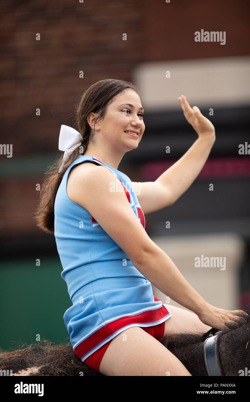 Peru, Indiana, USA July 21, 2018 Young women riding elephants down