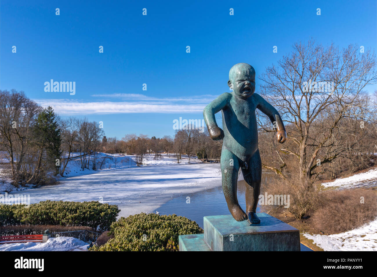 OSLO, NORWAY - APRIL 6, 2018: Oslo city skyline at famous Angry Boy Statue in Vigeland Sculpture Park, Oslo, Norway Stock Photo