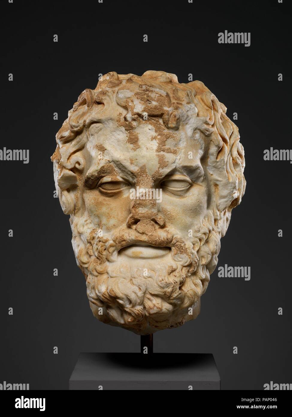 Marble head of a bearded man. Culture: Roman. Dimensions: H. 12 3/16 in. (31 cm). Date: 2nd century A.D..  Copy of a Greek statue of the 4th century B.C.  Since eight other Roman copies of this Greek portrait type are known, it probably represents a famous figure. Although there is no evidence for identification, some  scholars have suggested that the original statue portrayed the Athenian lawgiver Solon, one of the Seven Sages famed in antiquity for practical wisdom. This head is one of the most sensitive and crisp likenesses in the Metropolitan's collection of Roman copies of Greek portraits Stock Photo
