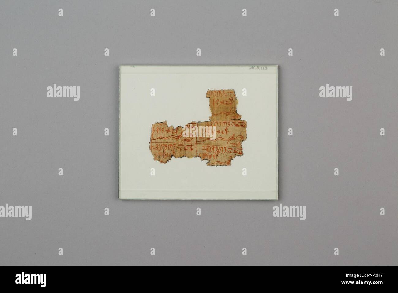 Fragment of Magical Papyrus. Dimensions: L. 7.5 × W. 6 cm (2 15/16 × 2 3/8 in.). Dynasty: Dynasty 25-26. Date: ca. 712-525 B.C.. Museum: Metropolitan Museum of Art, New York, USA. Stock Photo