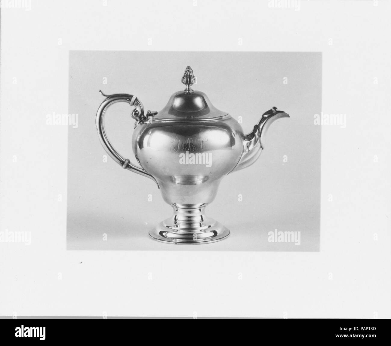Teapot. Culture: American. Dimensions: Overall: 8 1/4 x 9 1/2 x 5 9/16 in. (21 x 24.1 x 14.1 cm); 20 oz. 19 dwt. (651.6 g)  Foot: Diam. 4 1/8 in. (10.5 cm). Maker: George B. Foster (1810-1881). Date: 1840-50. Museum: Metropolitan Museum of Art, New York, USA. Stock Photo